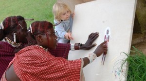 maasai-warriors-painting-with-child